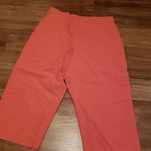 Coral colored long shorts/capris